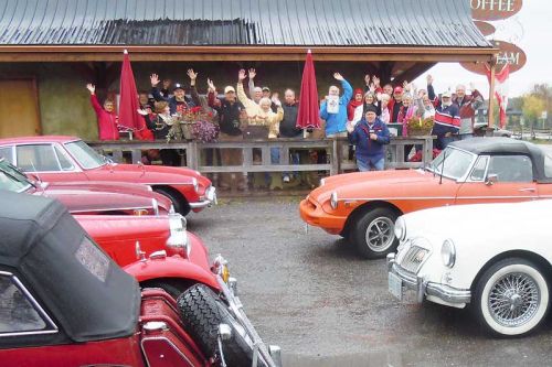 Members of the Ottawa MG Car Club make a pit stop in Maberly